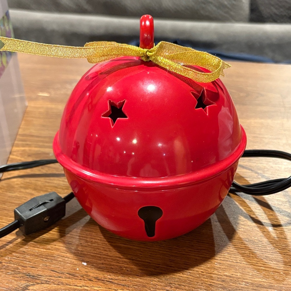 EUC Scentsy Sleigh Bell warmer with gold bow accent